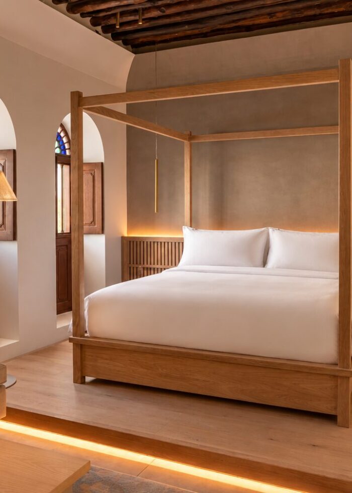 Warm Minimalist Four Poster Bedroom